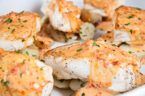 Fresh Baked Halibut with Roasted Tomato Coulis on a Bed of Roasted Potatoes