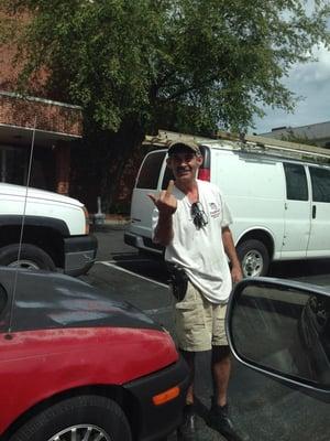 This is how the owner of the company greets a lady in the community.