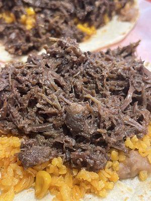 Slap Yo Momma Good Barbacoa Taco with rice n beans.