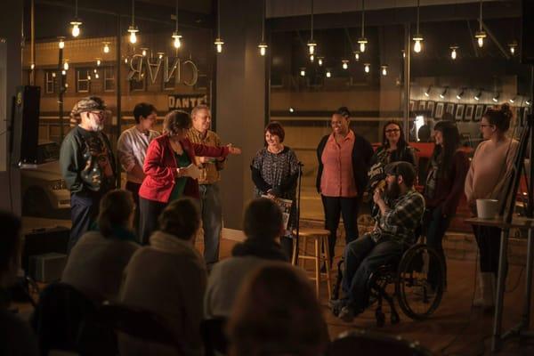 Sharon Nesbit-Davis winning the best story at the storytelling night!