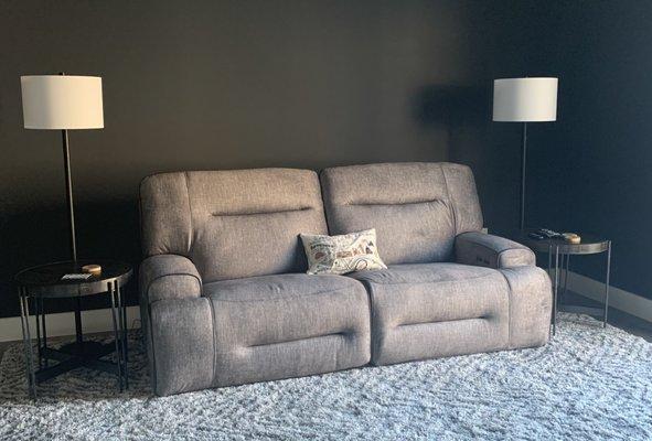 Reclining sofa and two side tables.