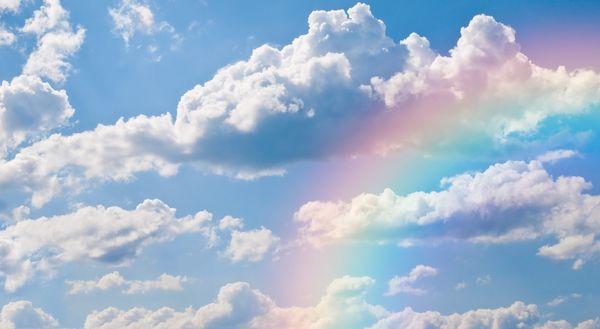 Happy clouds, and a rainbow
