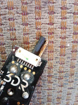 I know you do computers but would u know how to take this white square off and soder it back to my motherboard of my drone so it'l get power