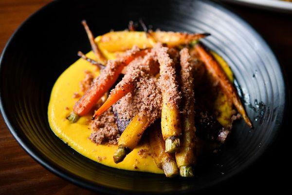 Roasted baby carrots, sumac breadcrumbs, barigoule sauce.