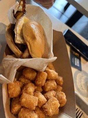 The Hangover Burger with bacon and fried egg and side of tator tots was great