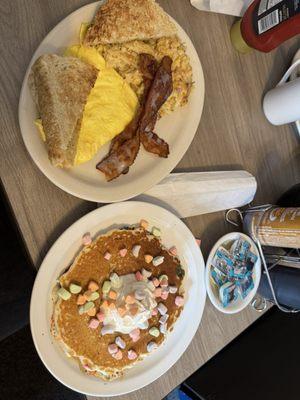 Bacon and eggs with their hash brown casserole (to die for), homemade bread honey oat and monthly special pancake