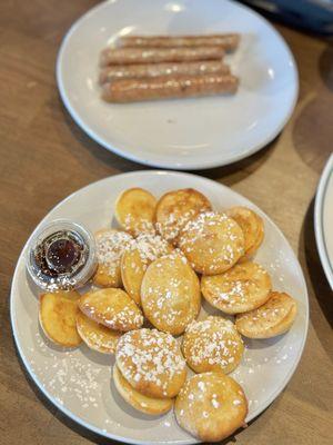 Kids menu - puff cakes + side of sausage.