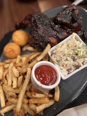 1/2 chicken with cornbread, fries, and coleslaw