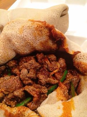 Apparently I'm the first to dine and Yelp. Beef is tender,  sauce is spicy & oily, and  injera is just right. Very satisfying.