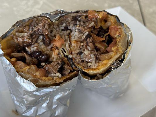 A spicy, steak burrito.