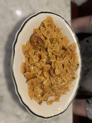 Bow tie pasta with shrimp and tomato sherry cream sauce