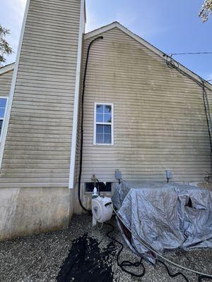 Before siding cleaned.