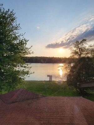 Lakeside waterfront view of sunset from dining room at Little Mexico in Siren, Wisconsin.