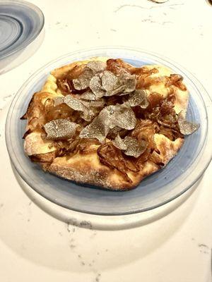 Flat bread with carmelized onions and truffle