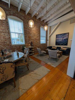 Intimate tasting area with comfortable chairs, couch