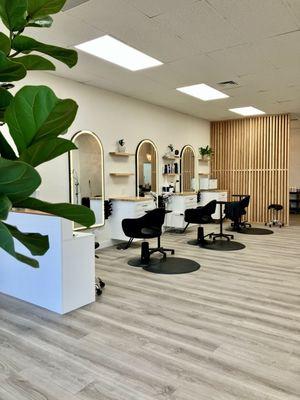 Some of the chairs in the salon seen from the waiting area, so pretty!!