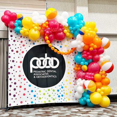 Pediatric Dental Associates and Orthodontics Team Building Balloon Garland Decor and Backdrop.