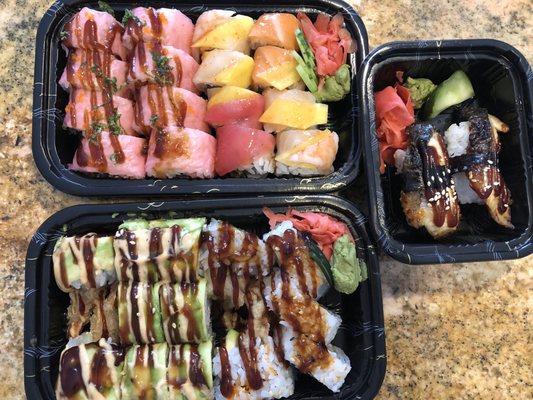 Pink lady roll, lion king roll, spider roll and eel sushi