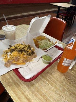 Asada fries and enchiladas