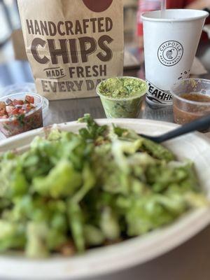 Sofritas bowl with a side of Chips and guac