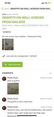 Complaint to Prescott Companies to make them aware of the graffiti tagged on the retainer wall into the community