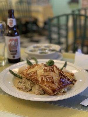 Bouchee a la reine aux fruits de mer (seafood ragout in a puff pastry crust)