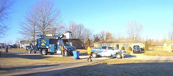 Trespassing in my yard and blocking my driveway so I can't get out.