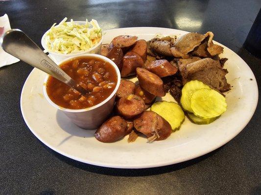 Brisket and jalapeño sausage with slaw and beans