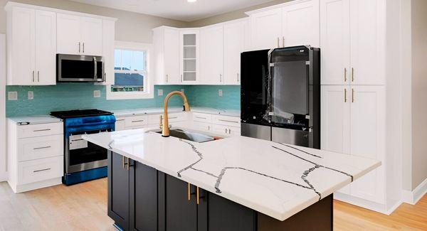 Modern two tone kitchen with aqua subway tile and white quartz countertops