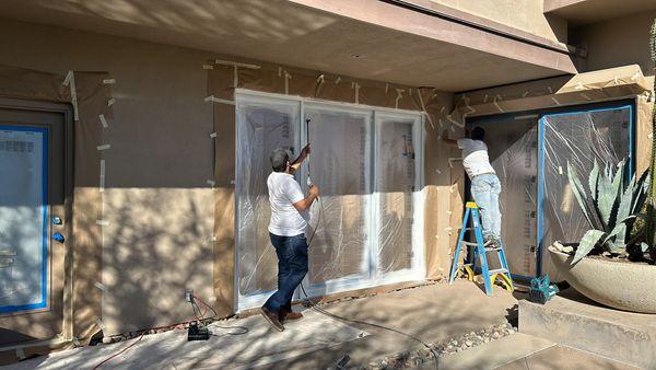 The process of prim and painting window trims Paradise Valley Home