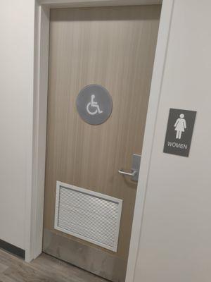 Solid core wood door w/ steel louver (vent) and hollow meatal frame.