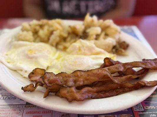 2 over medium eggs with bacon and potatoes