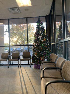 Christmas tree is decorated year round for all the holidays . Love it!