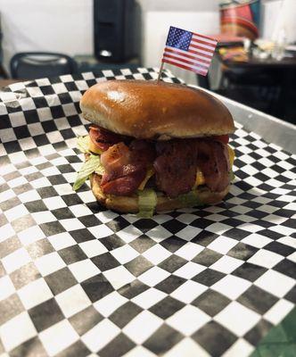 CJs burger with bacon and cheese