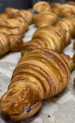 Our classic croissants just out of oven and headed to market