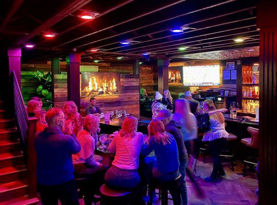 Inside looking towards piano ( fireplace is really TV)