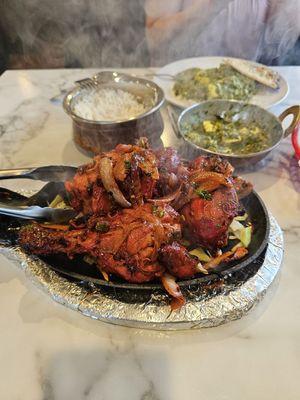 Tandoor Chicken and Saag Paneer with Garlic Naan! Tandoori Chicken comes out smokin' hot! Amazing.
