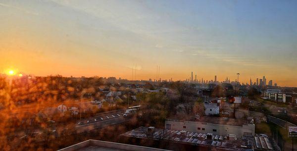 Sunrise over NYC from our room.