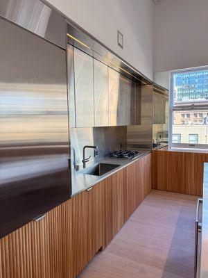 stainless steel doors, fluted oak doors, oak interiors