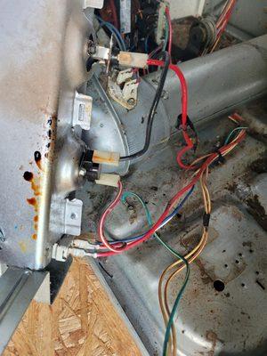 Replacing faulty limit switch and cleaning out dryer from inside.