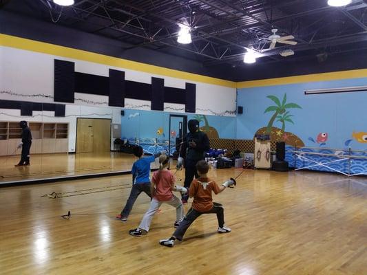 Beginners are working out with Coach Chris. Early birds catch the worms.