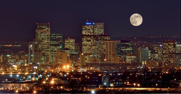 Downtown Denver at night. Come see us at Onsite Computer Services
