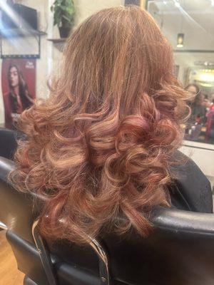 Winter warm colors with some highlights and a layered long cut.