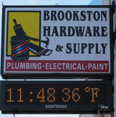 Sign on front of Brookston Hardware, 101 E. 3rd. Street (SR 18), Brookston, Indiana. Digital sign tells time and temp, etc.