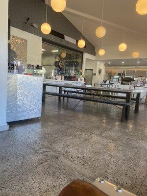 Waiting area with a coffee shop.