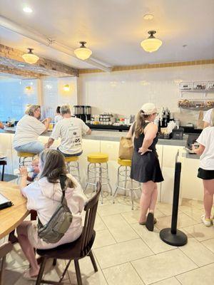 Pick up counter for coffee and seating at the coffee bar