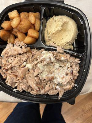 Chick shwarma plate with hummus and regular potatoes.