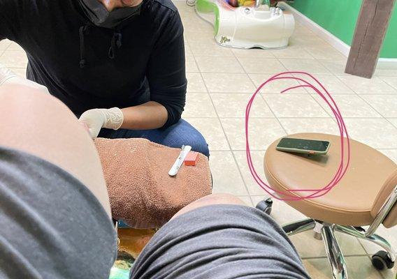 Nail tech talking to friend for over an hour on speaker phone.