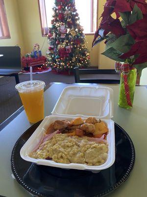 Mangu (mashed plantains) with pollo guisado (stewed chicken) and passion fruit & pineapple juice