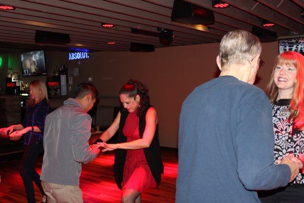 Teaching Salsa lessons at Rustix Pub in Portland, OR